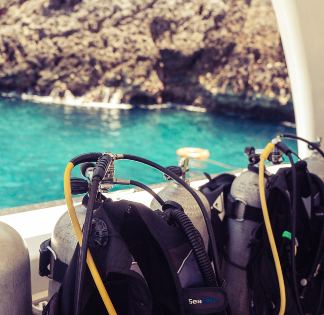 Dive equipment for the Cabo Cabrón expedition Scuba tanks and diving equipment prepared aboard the boat at Cabo Cabrón