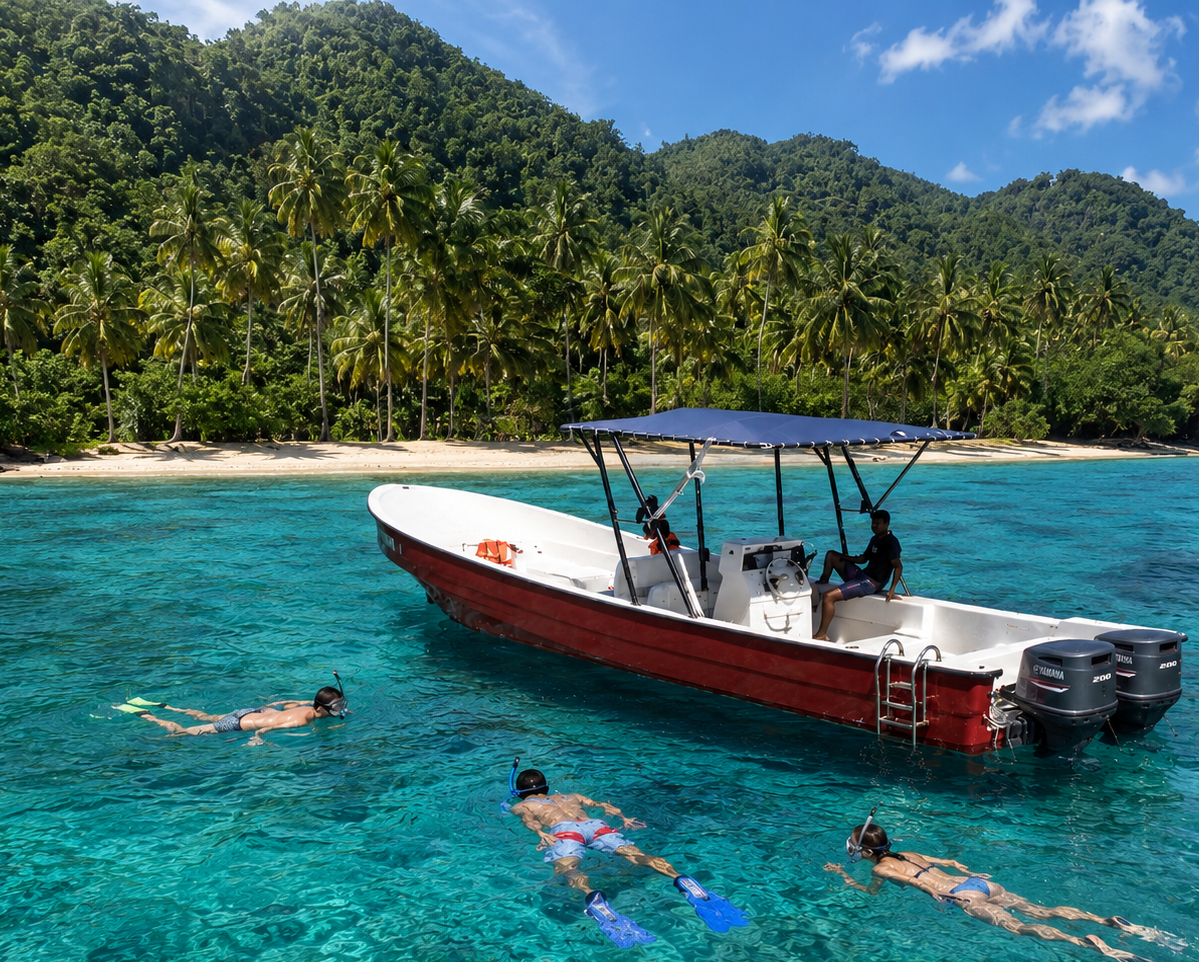 Half-day snorkeling adventure from Las Terrenas Snorkelers swimming beside the Latif speedboat near Jackson Bay